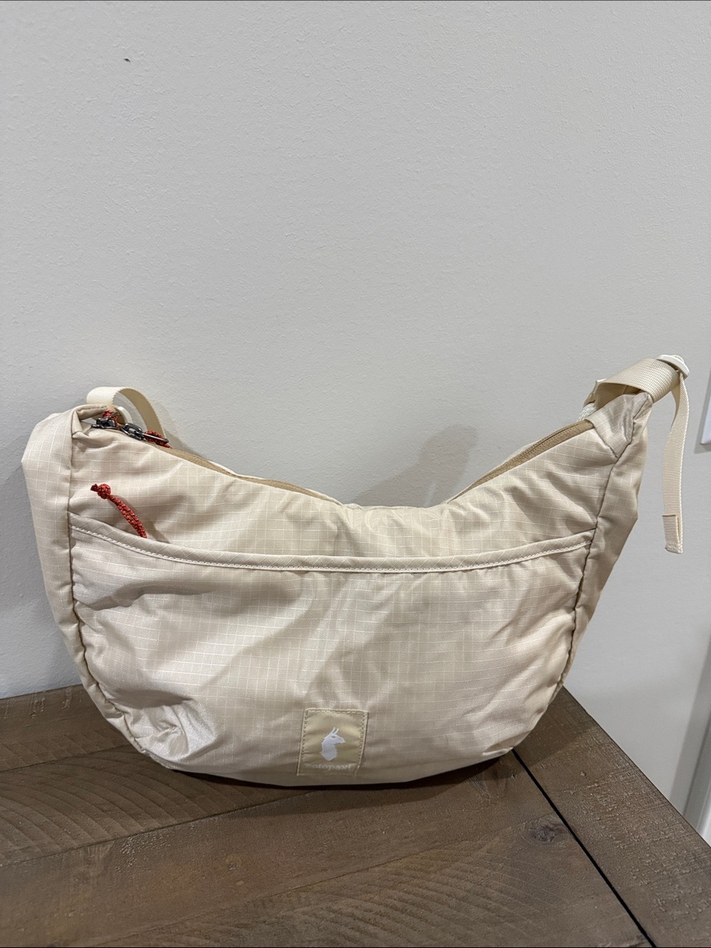 Cotopaxi Cream Shoulder Bag